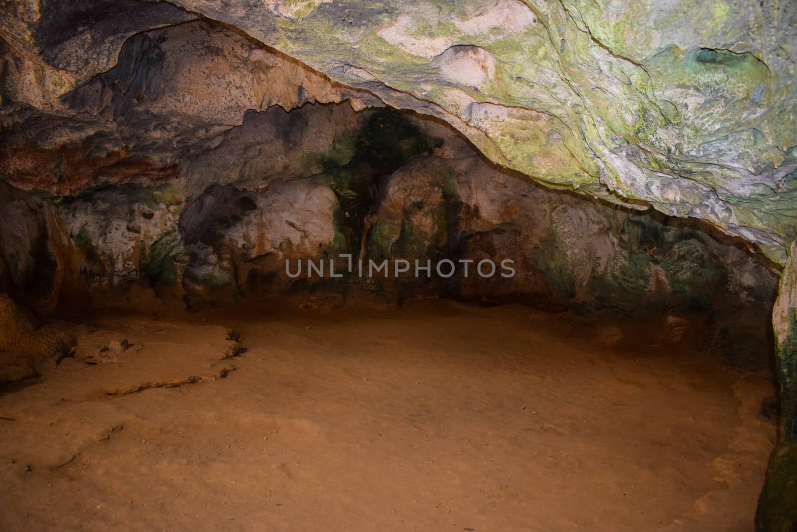 Arikok Natural Park on the island of Aruba in the Caribbean Sea with deserts and ocean waves on the rocky coast