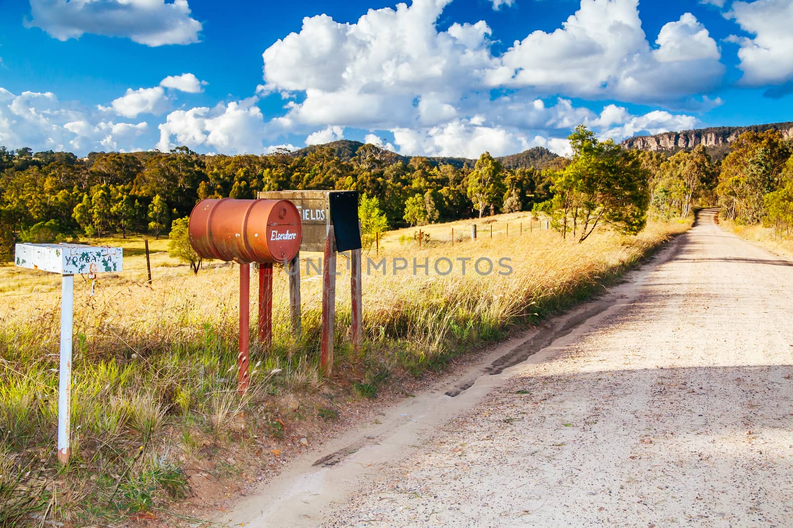 Letterboxes line a dirt road in Megalong Valley, Blue Mountains, Australia