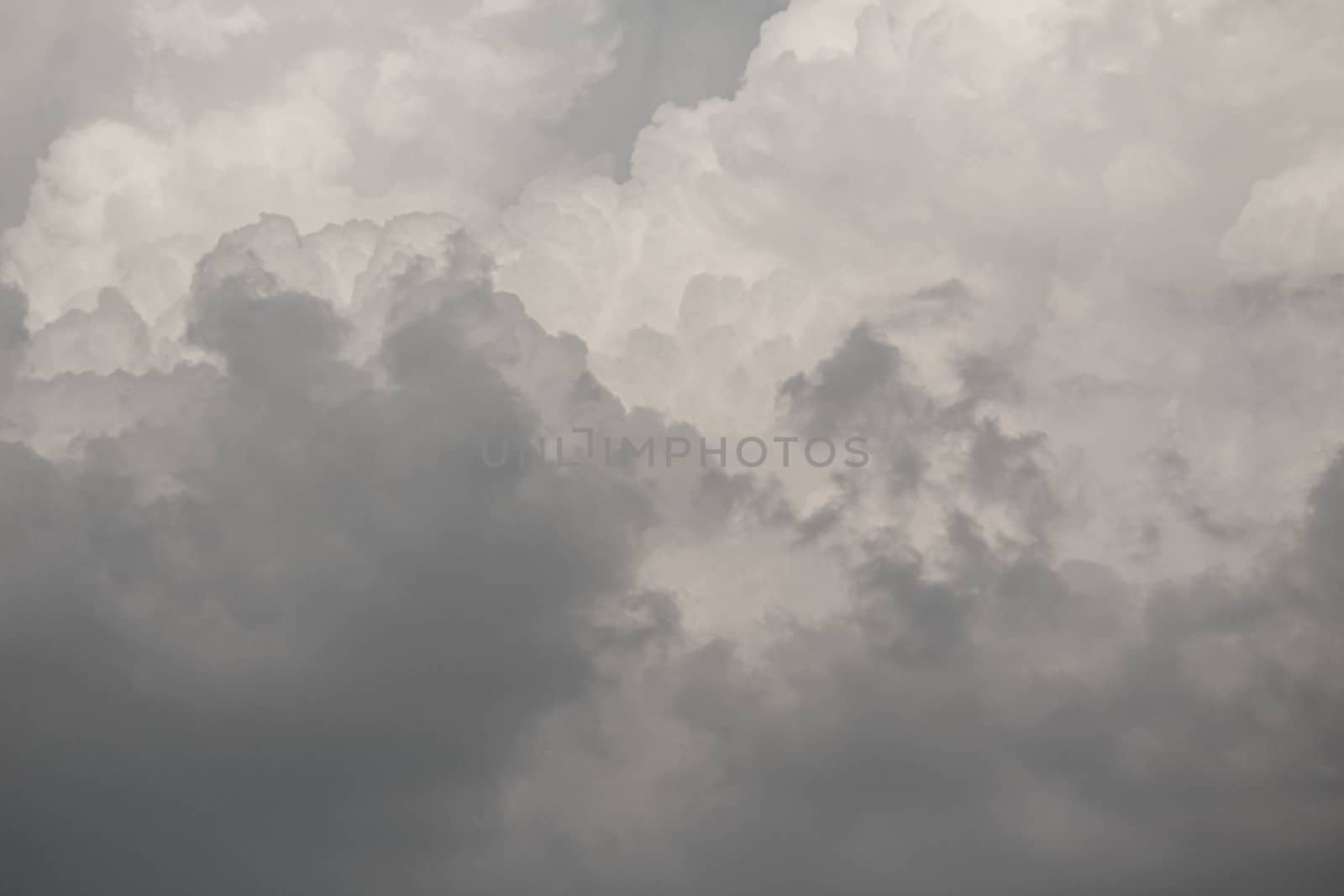 The Dark gray dramatic sky with large clouds in rainy seasons.