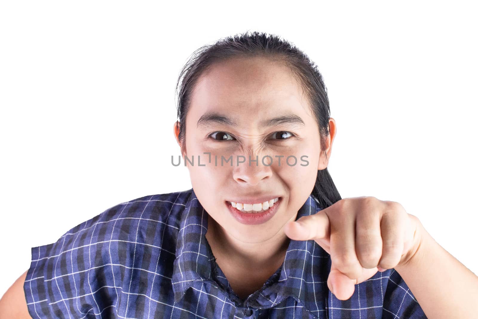 Close-up Angry face of Asian young woman in blue shirt pointing with finger to the camera. by TEERASAK