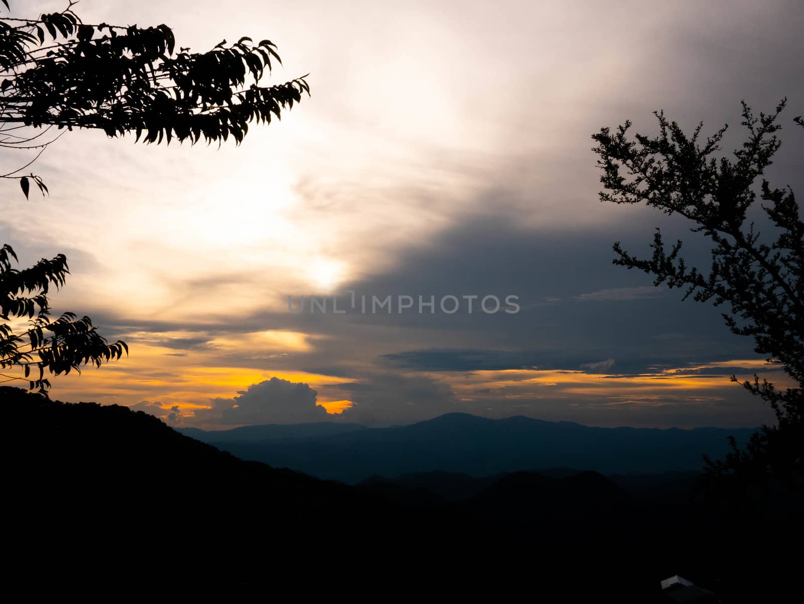 Landscape view of complex mountain with sunset in the evening in by TEERASAK
