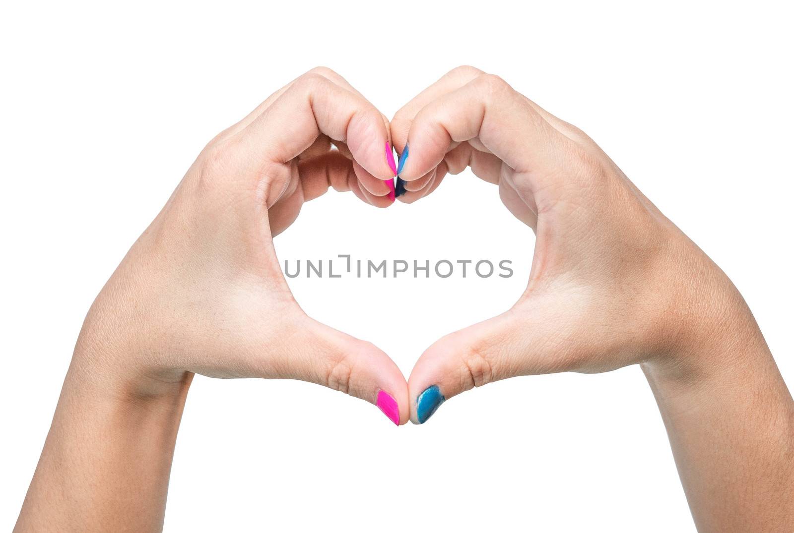 Close-up of a woman's hand showing heart sign with a pink and blue nail polish isolated on a white background.