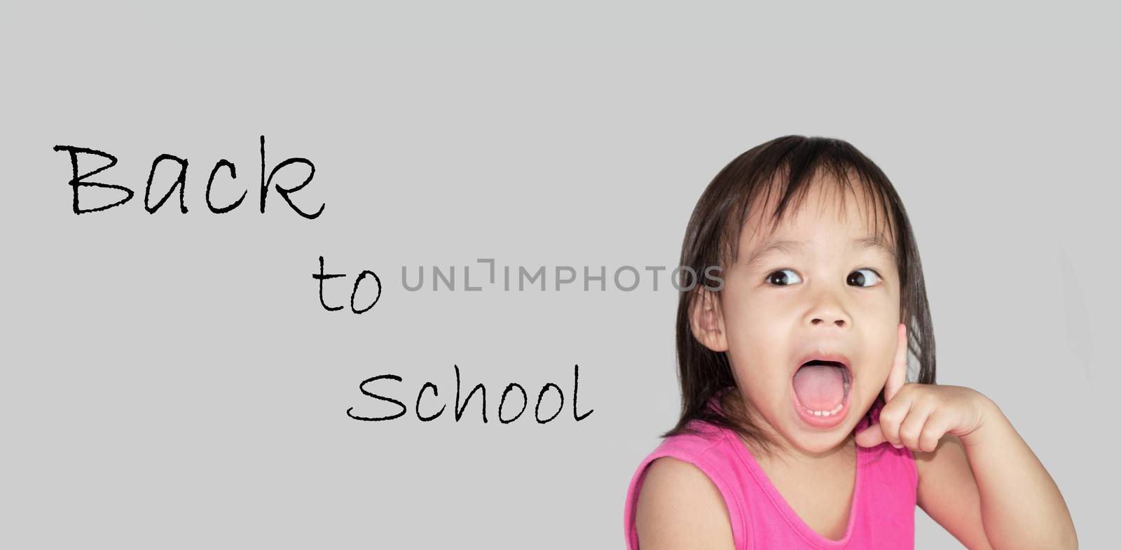 Lovely Little Asian child thinking. Back to school concept.