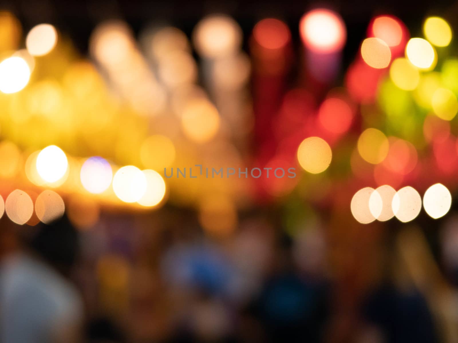 Abstract bokeh background of light from Thai lanna lantern at night.  Concepts of celebration in Yi Peng Festival.