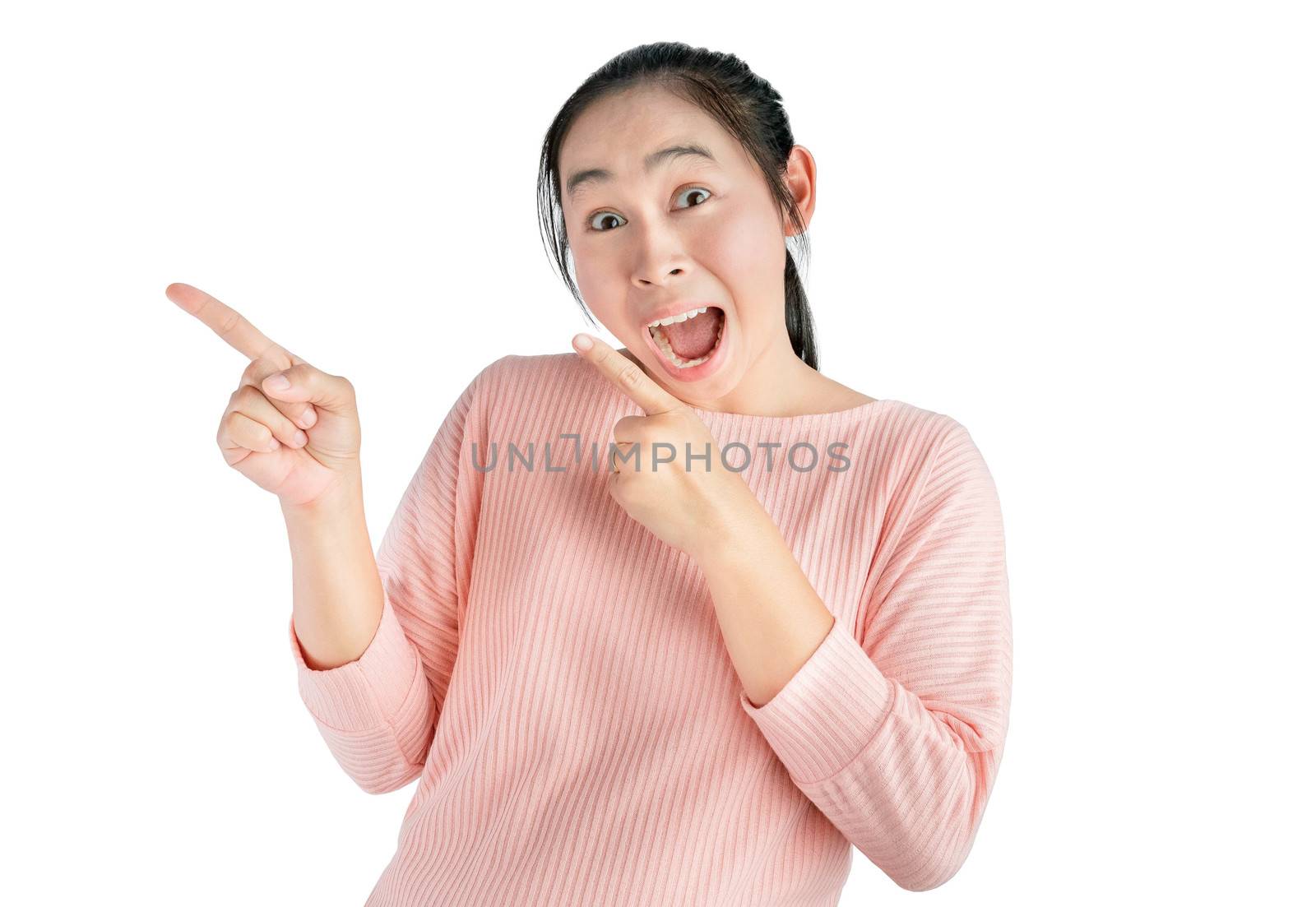 Wow and surprised face of young Asian woman wear pink t-shirt with hand point on empty space.