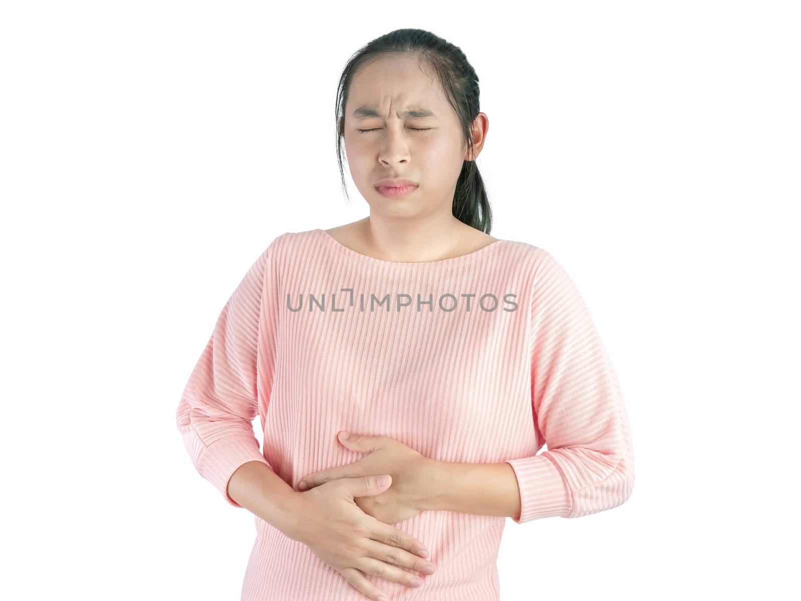 Unhealthy Asian woman suffering from stomachache and keeps hands on belly, Isolated on white background. by TEERASAK