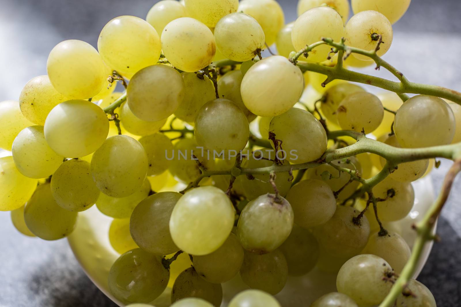 green wine grapes on a stick