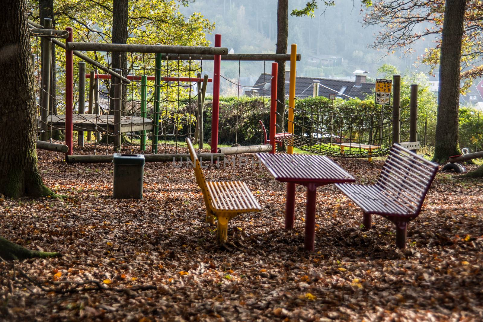 Children's playground with sports equipment in the deciduous forest