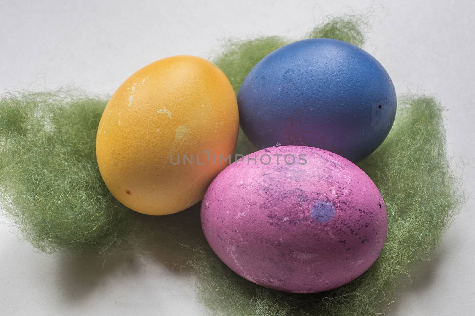 colorful easter eggs in the nest by Dr-Lange