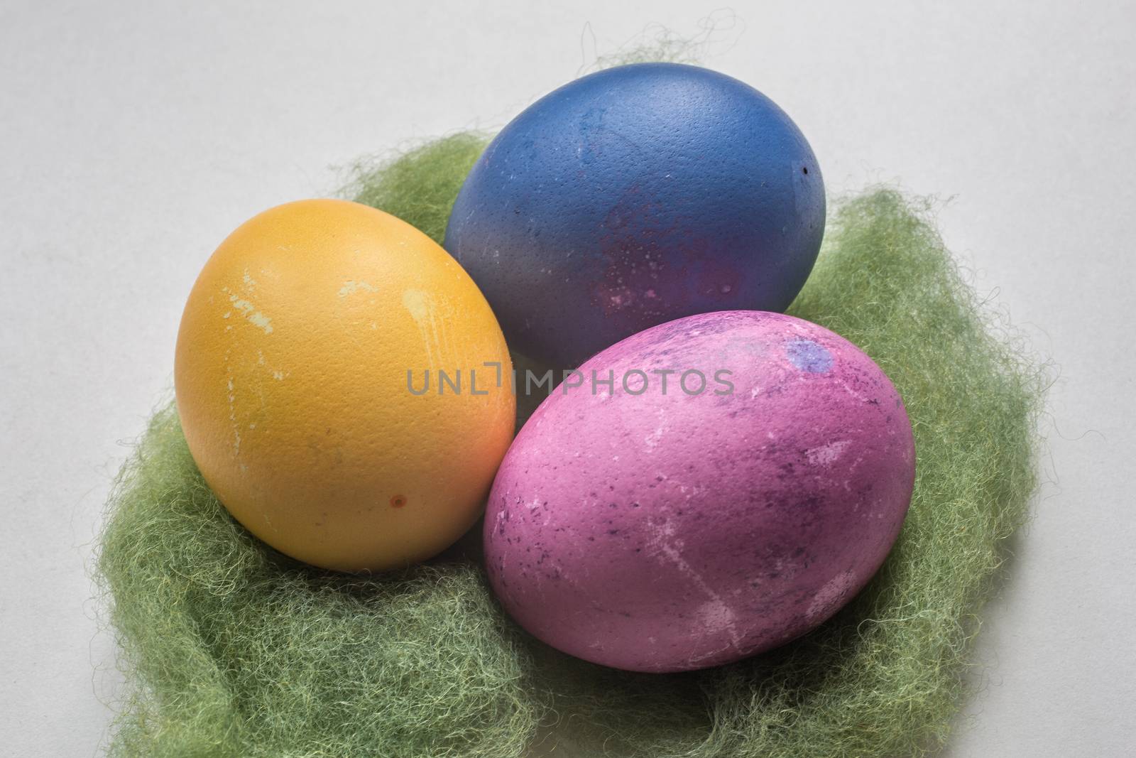 colorful easter eggs in the nest by Dr-Lange