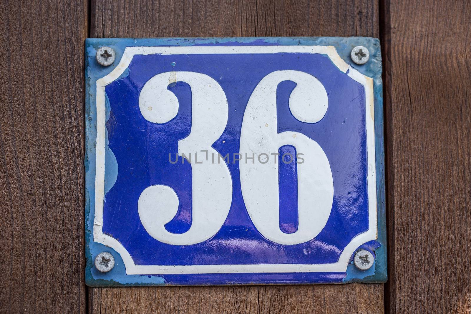 antique blue white house number in enamel