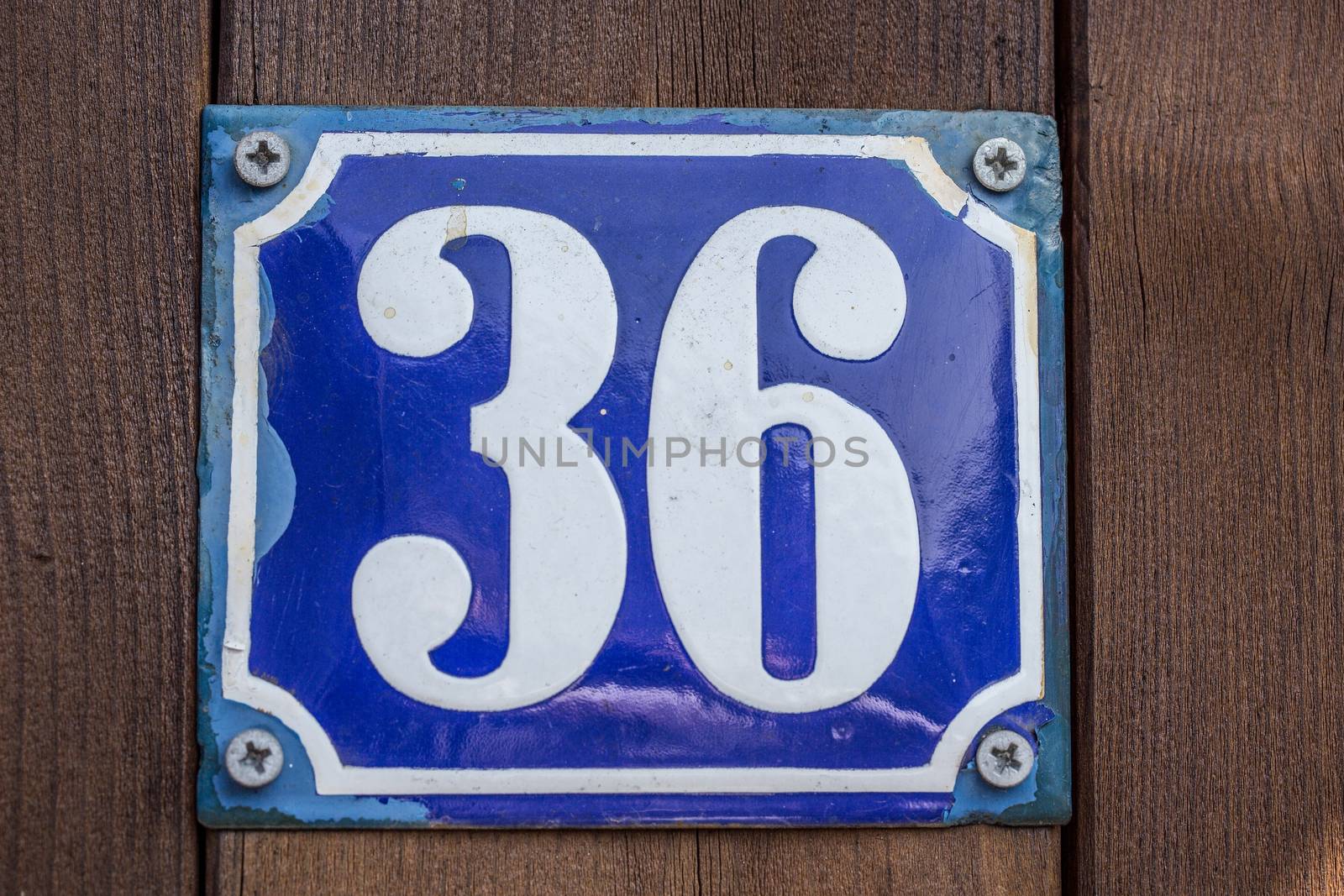 antique blue white house number in enamel