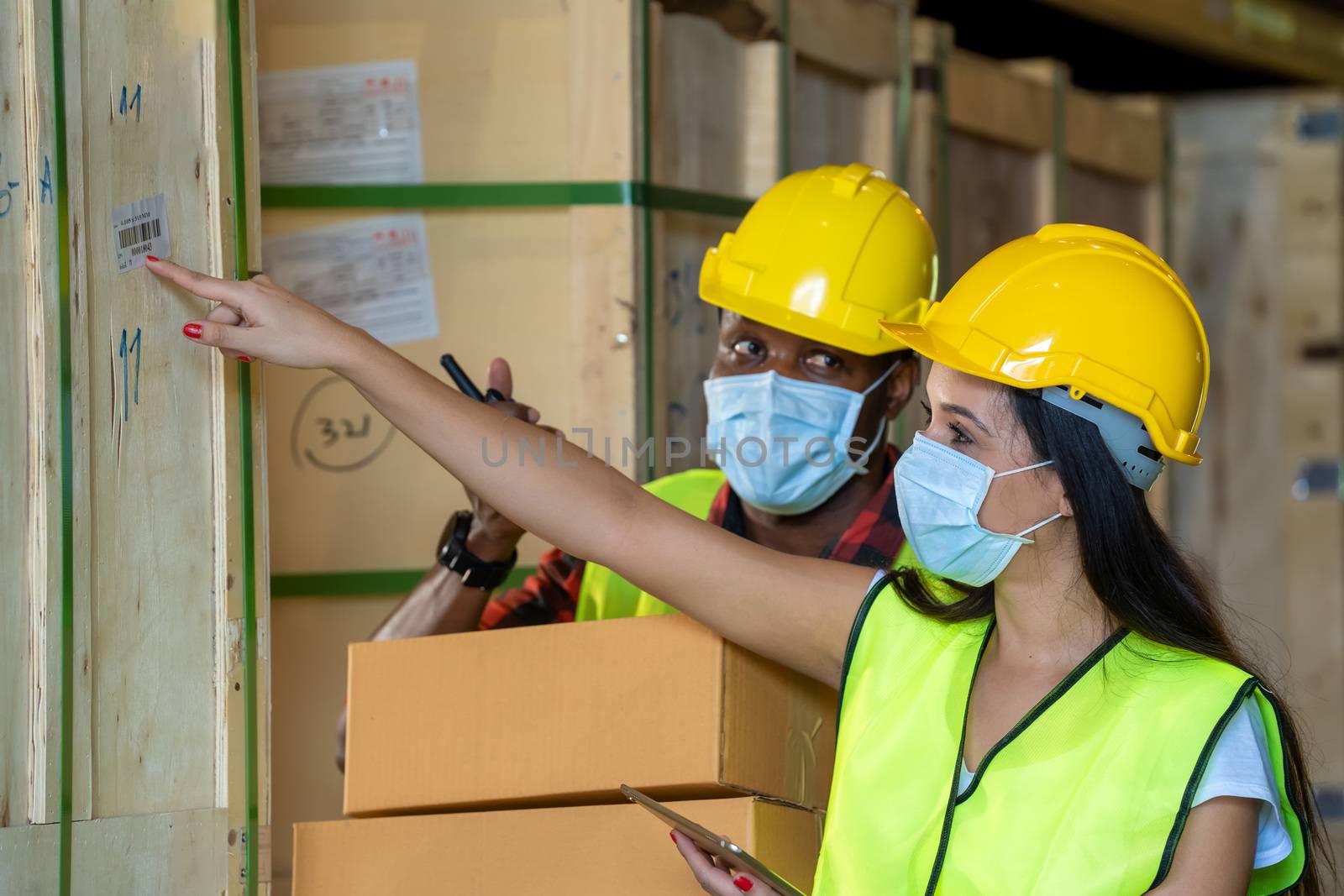 Group warehouse workers wearing protective mask to Protect Again by Visoot