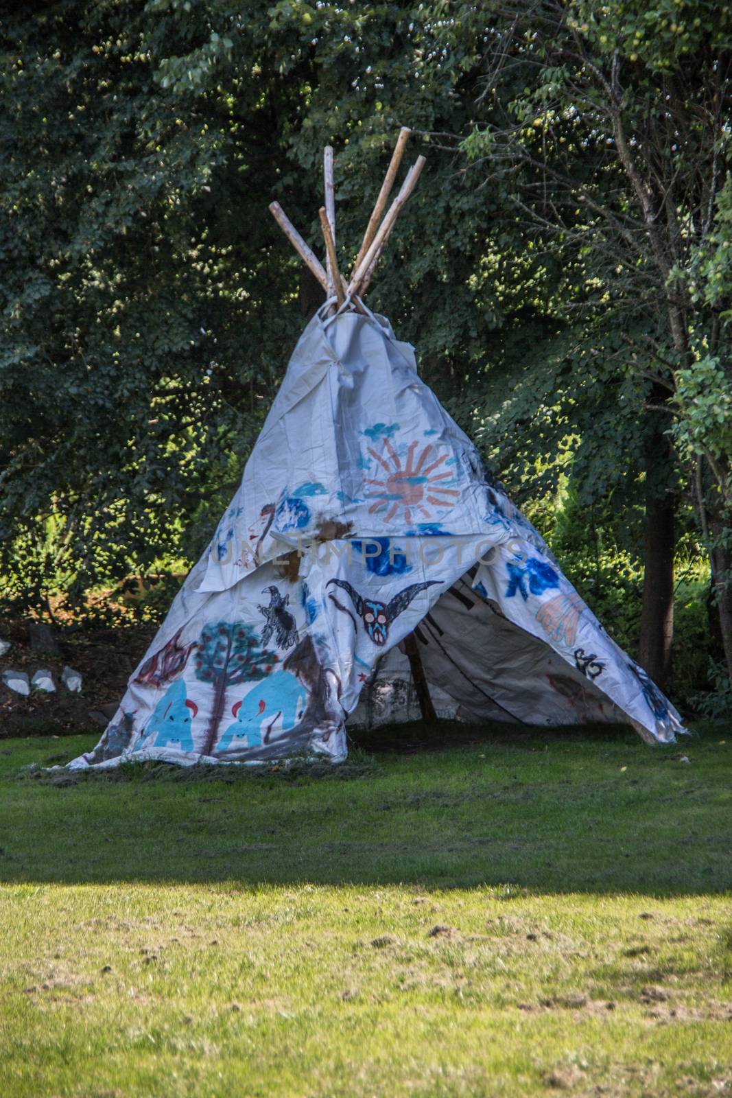 colorful Indian tent on village meadow