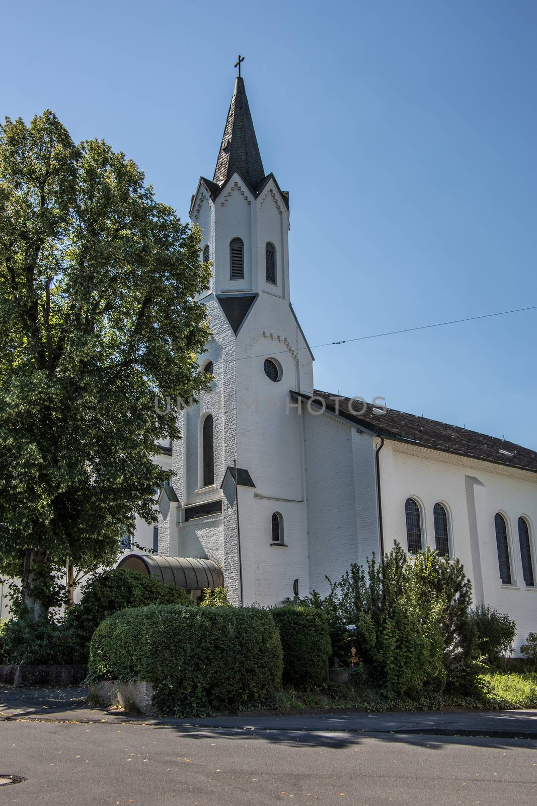 christian church with steeple in know by Dr-Lange