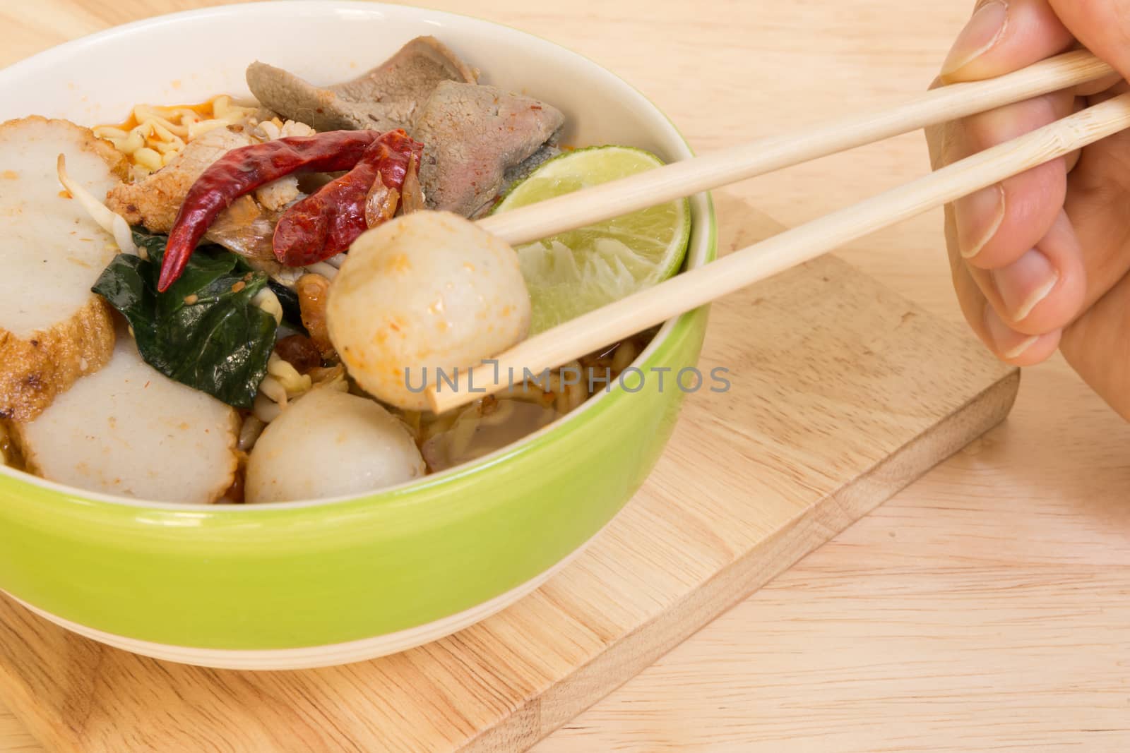 Tom Yum Spicy Soup Noodle with Fish Ball and Pork : Popular Thai Food