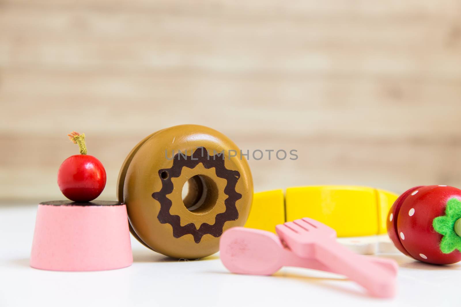 Fake food and kitchen equipment for little children.