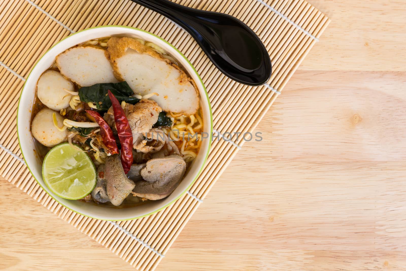 Tom Yum Spicy Soup Noodle with Fish Ball and Pork : Popular Thai Food