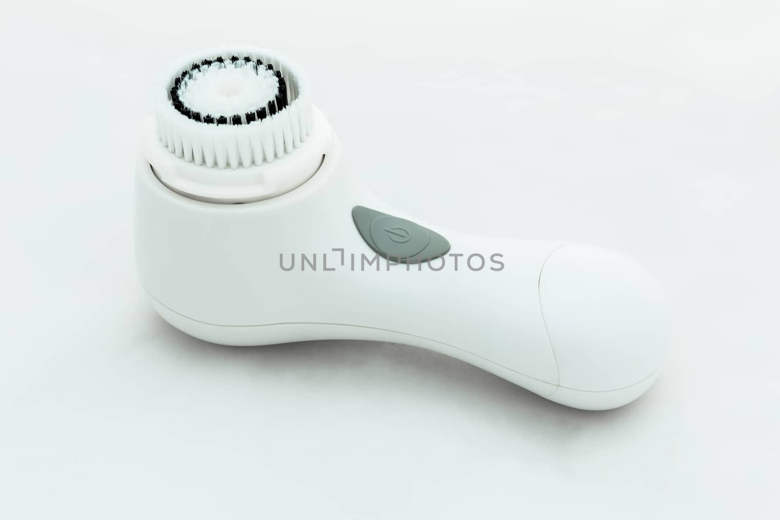 Face brush isolated on white background.