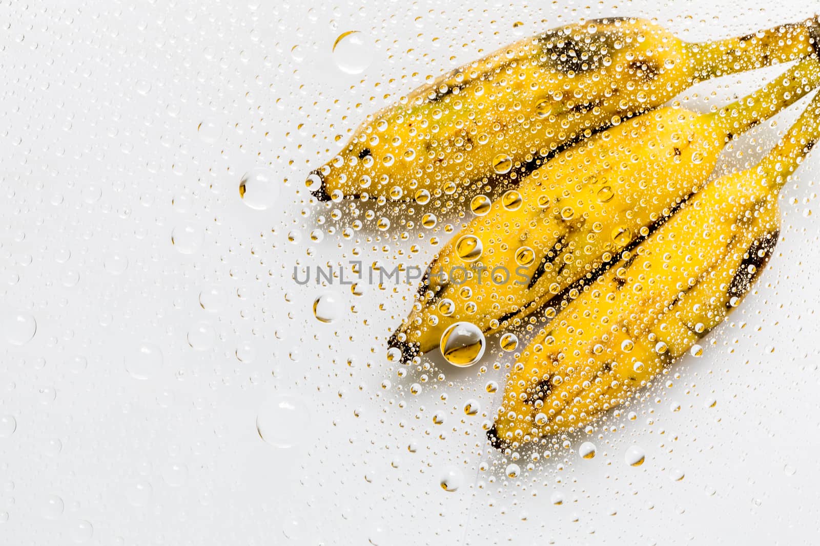 Water drop, droplet, raindrop of banana background