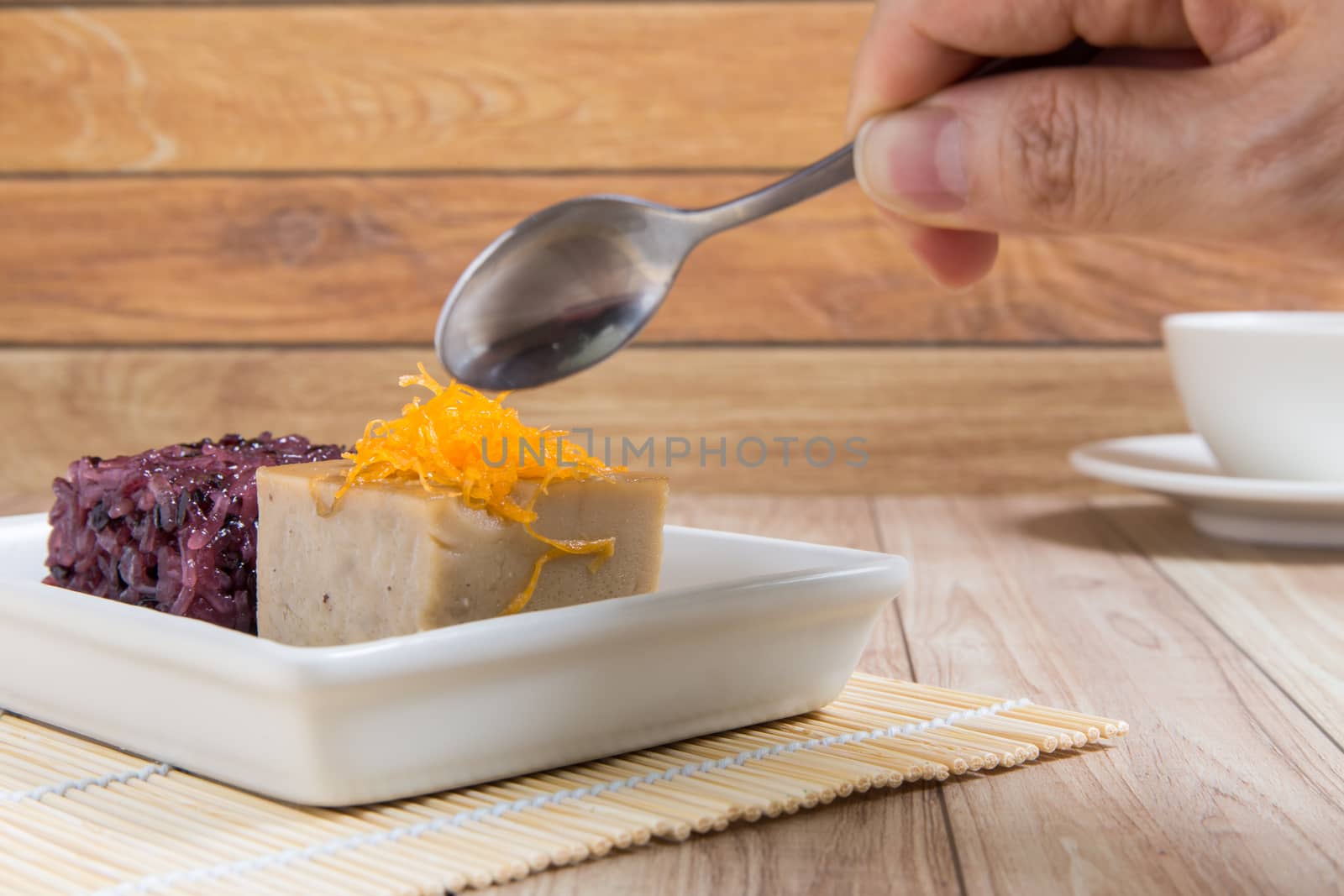 Sweet Thai recipe made with black rice, sugar, and egg.