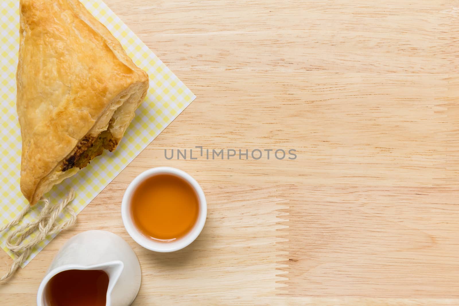 Freshly made puff pastry pie for tea break.