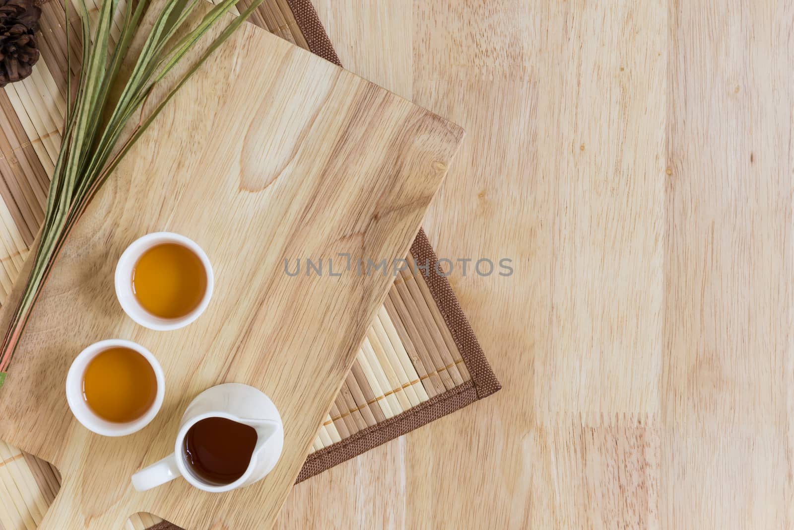 Wood Texture Background Decorated by Cutting Plate and Cups of Tea