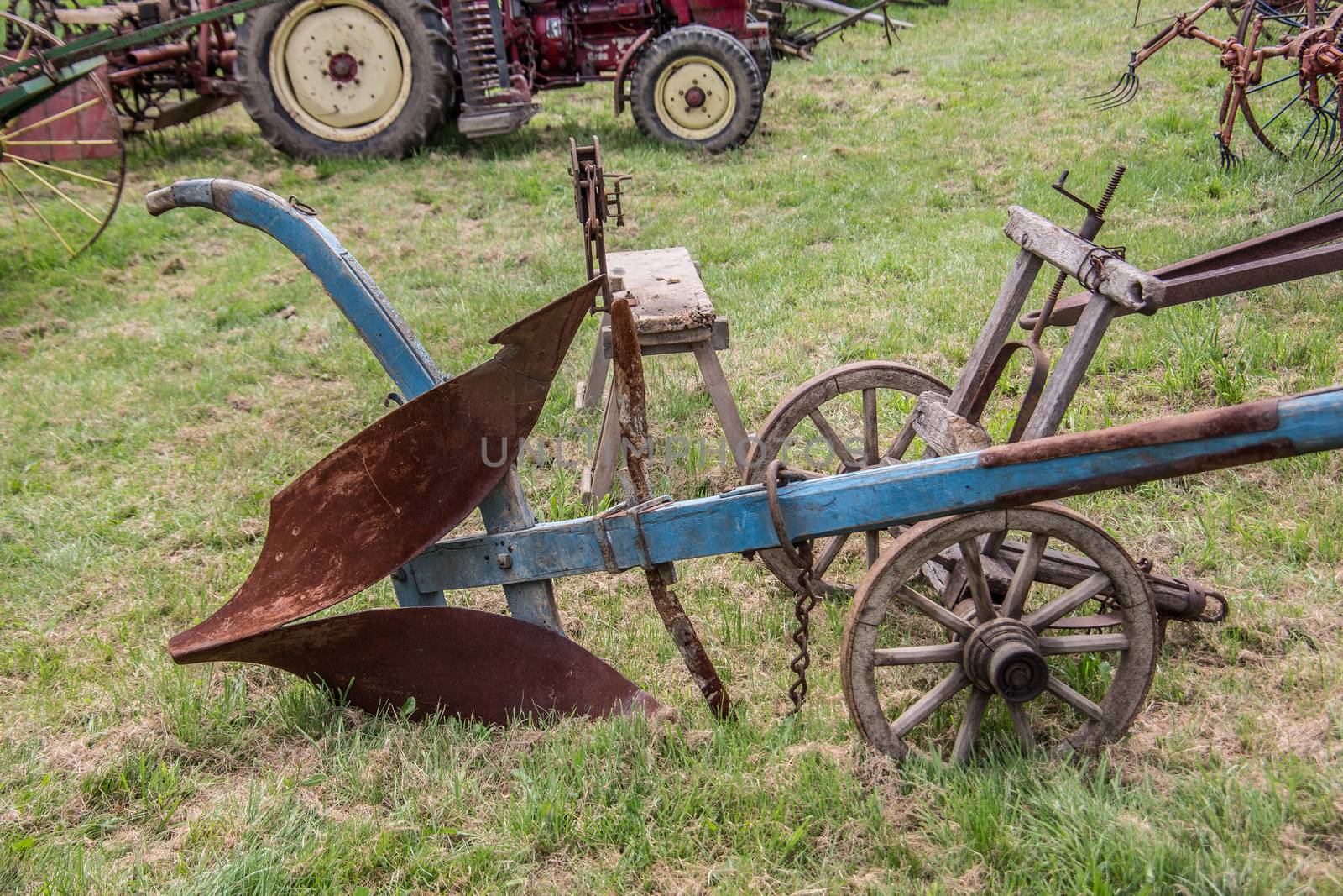 Historic agricultural machinery on the field