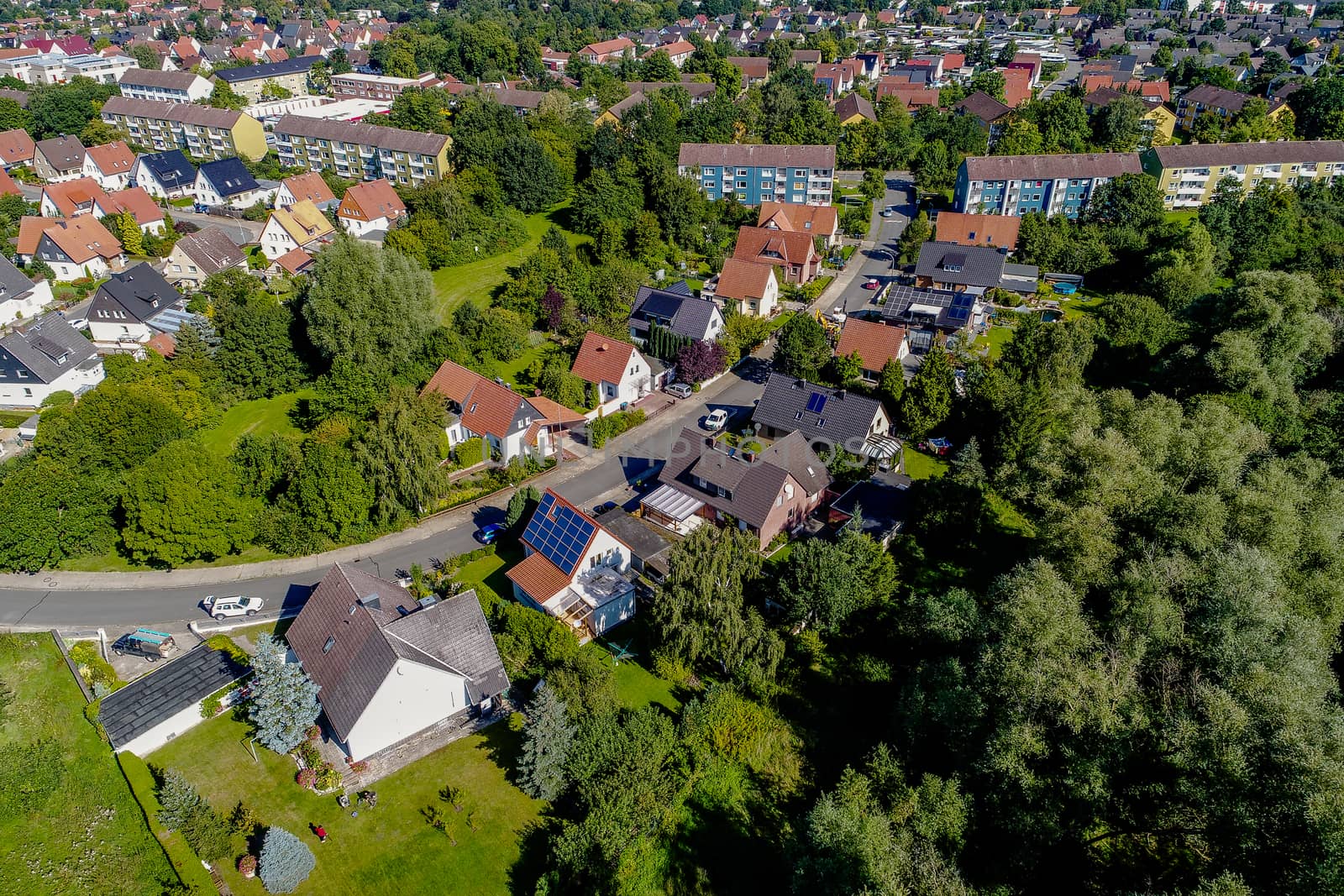 German suburb with forest, aerial photo  by geogif