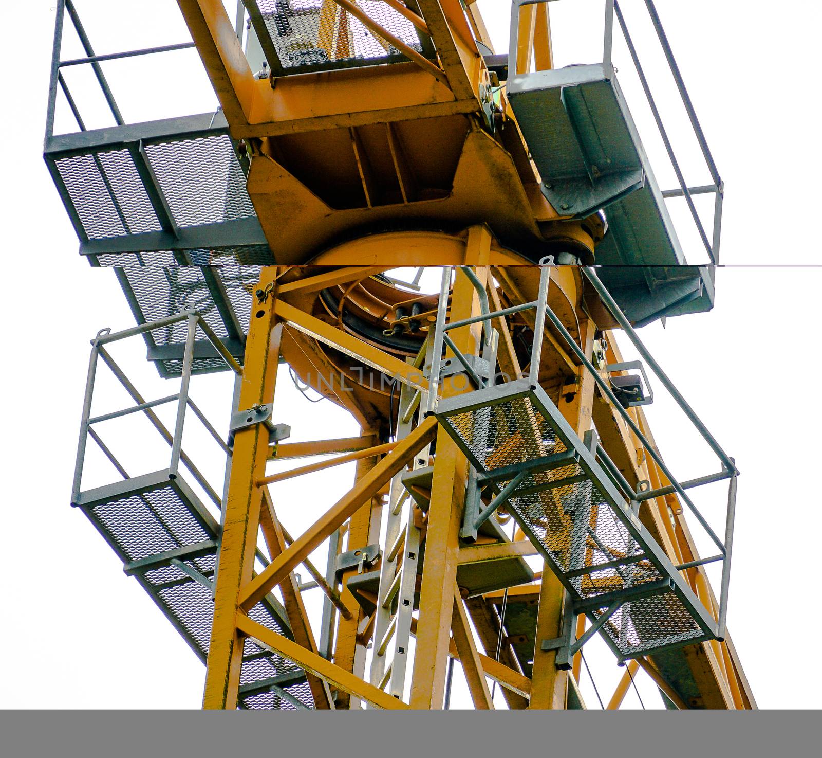 Cabin of a crane, shot from below, construction site