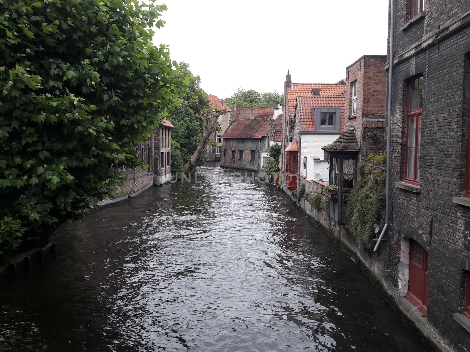 Classic view of the historic city center of Bruges (Brugge), West Flanders province, Belgium. Cityscape of Bruges. Architecture and landmark of Bruges