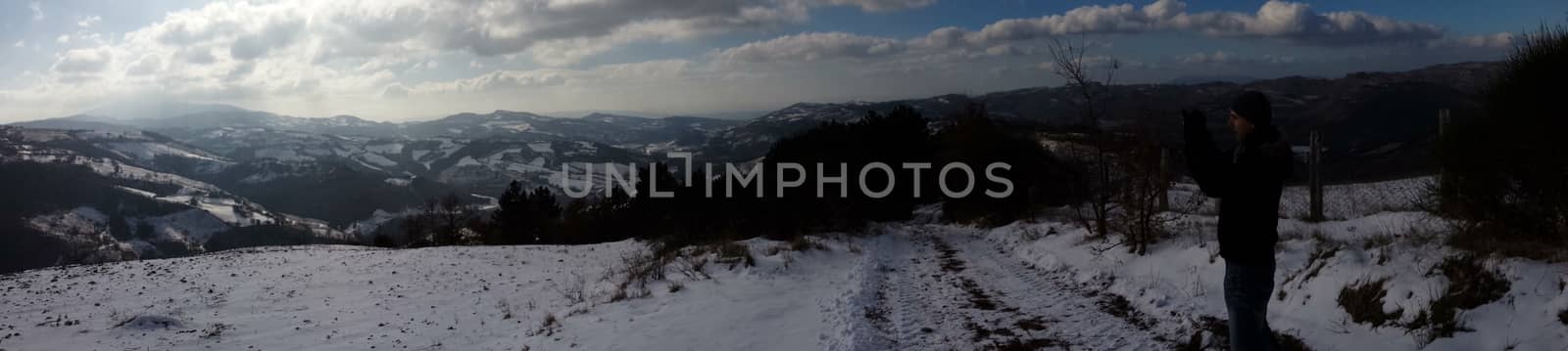 The countryside of Umbria near to Gubbio under the snow during the Winter - Beautiful landscape covered by snow in a sunny day