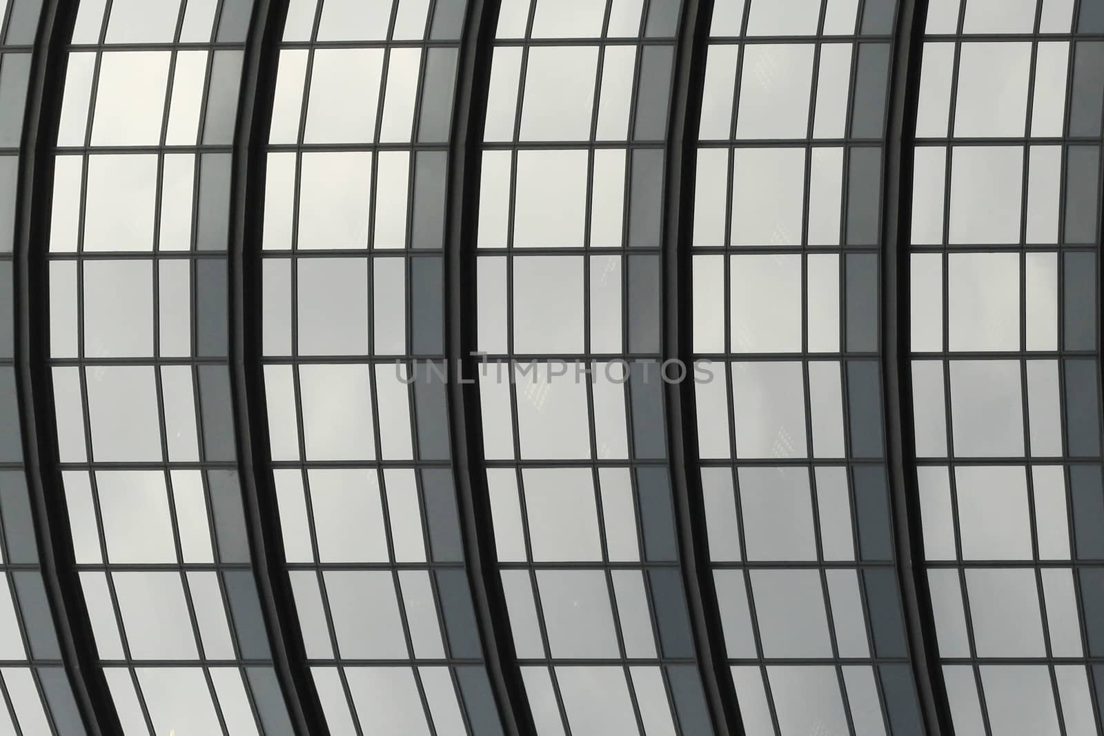 Windows in a modern office building create an interesting texture for the designer