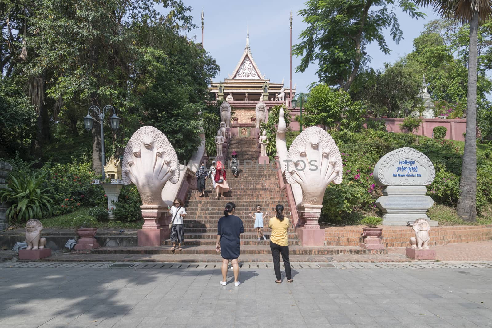 People taking the Stairs going to the temples at Wat Phnom Histo by GABIS