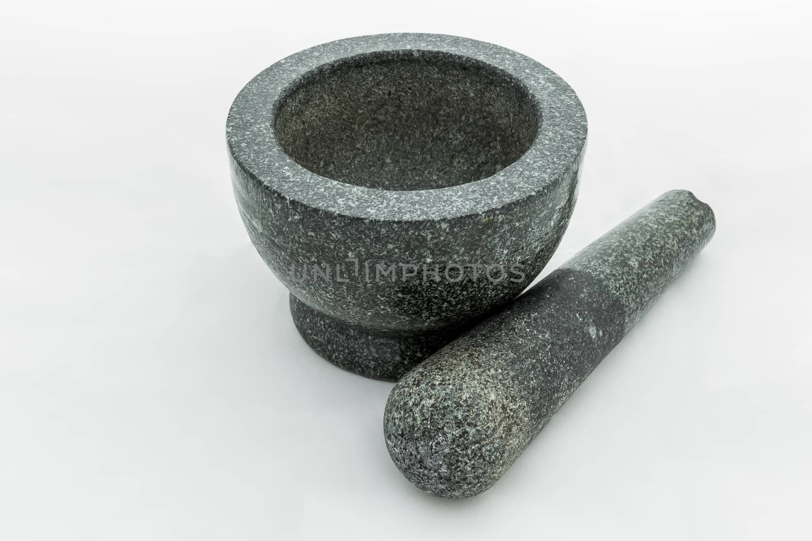 Stone mortar isolated on white background.