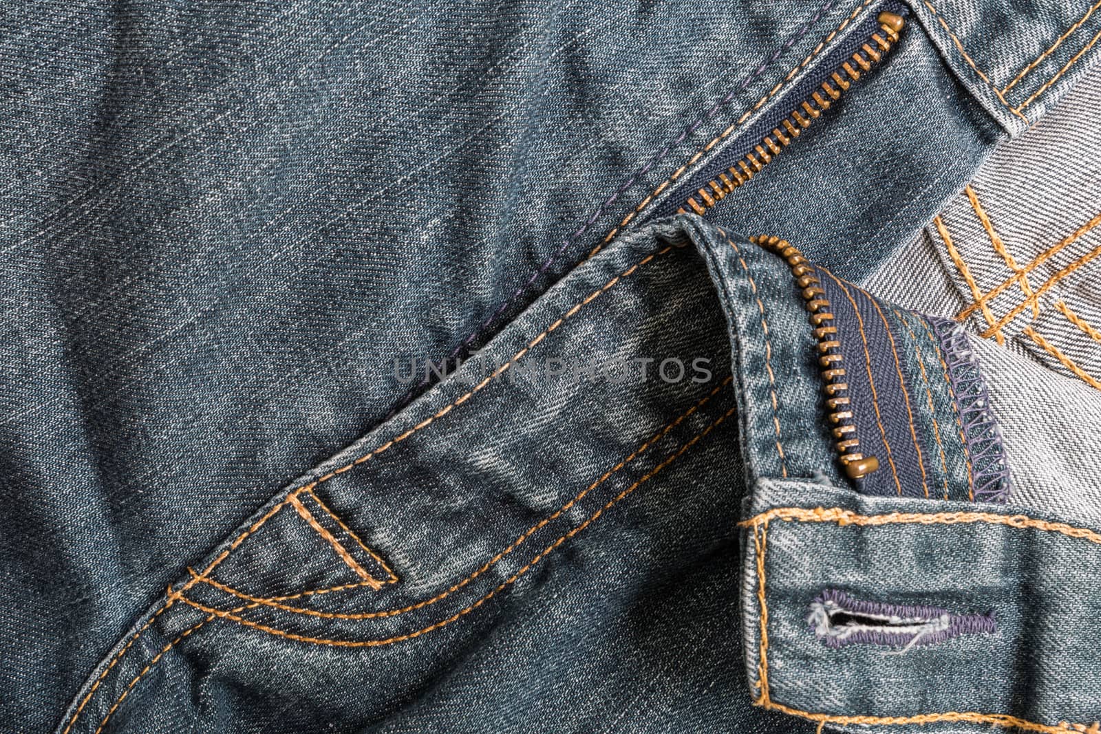 Old blue jeans background