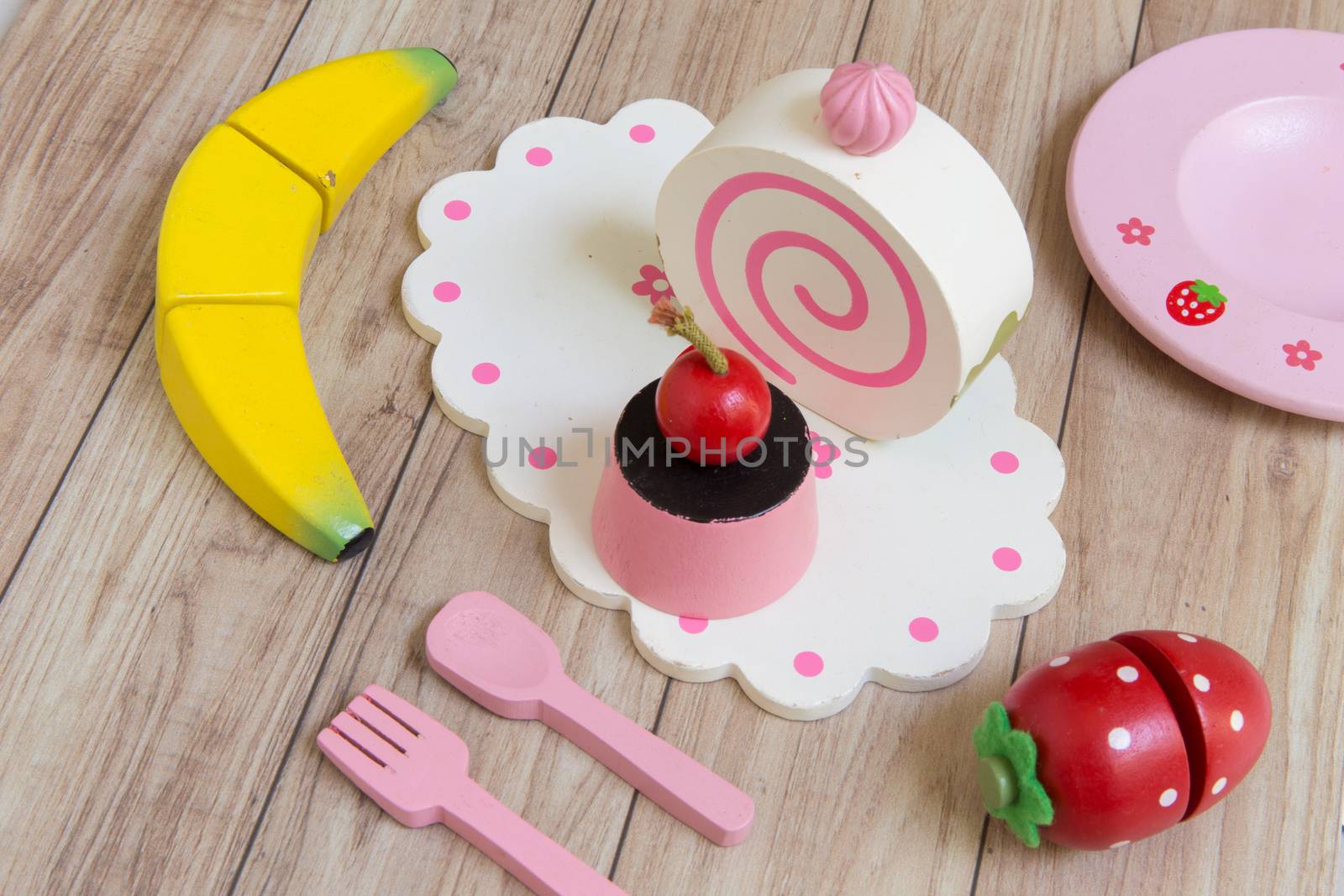 Fake food and kitchen equipment for little children.