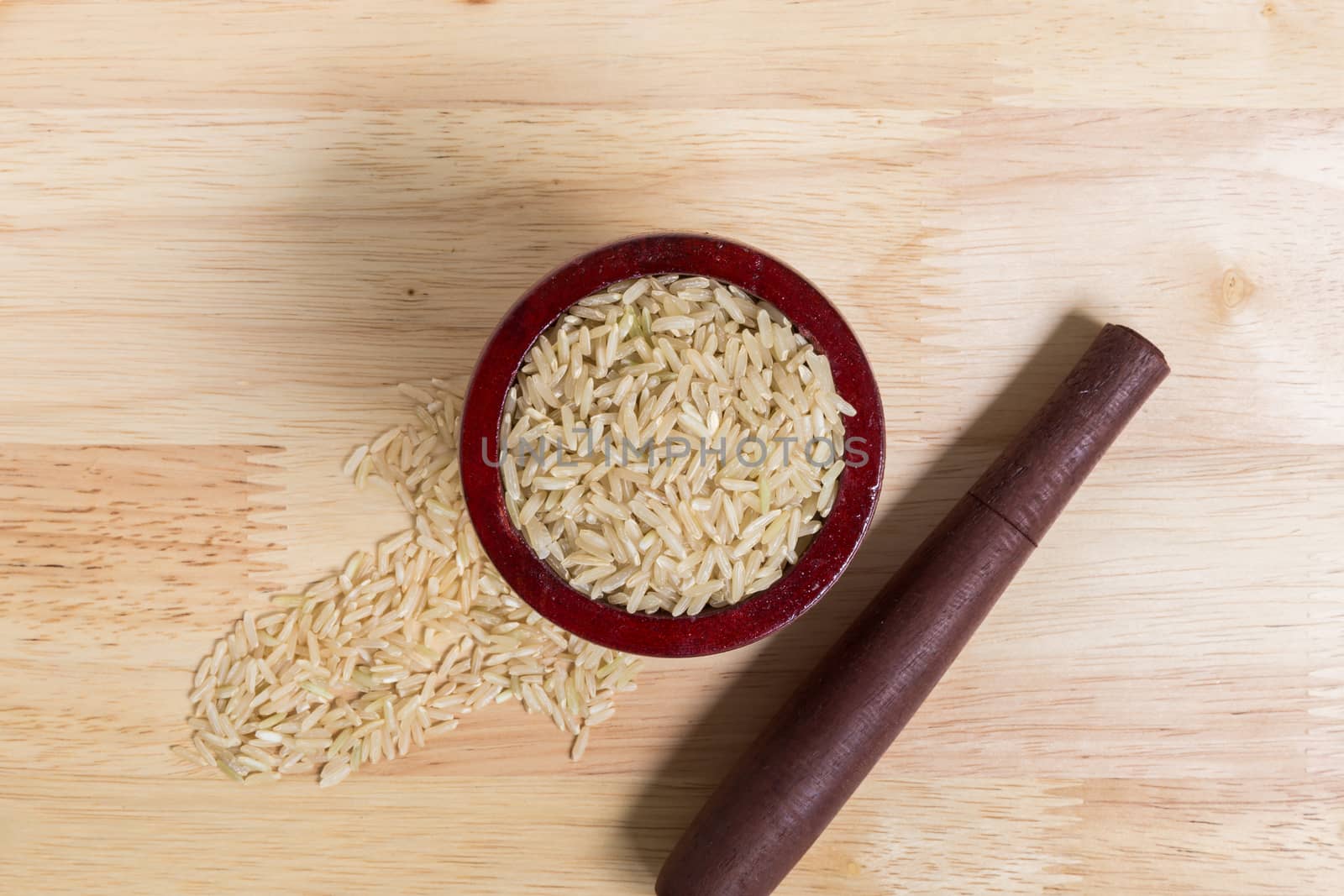 Uncooked Jasmine Brown Rice in Mortar