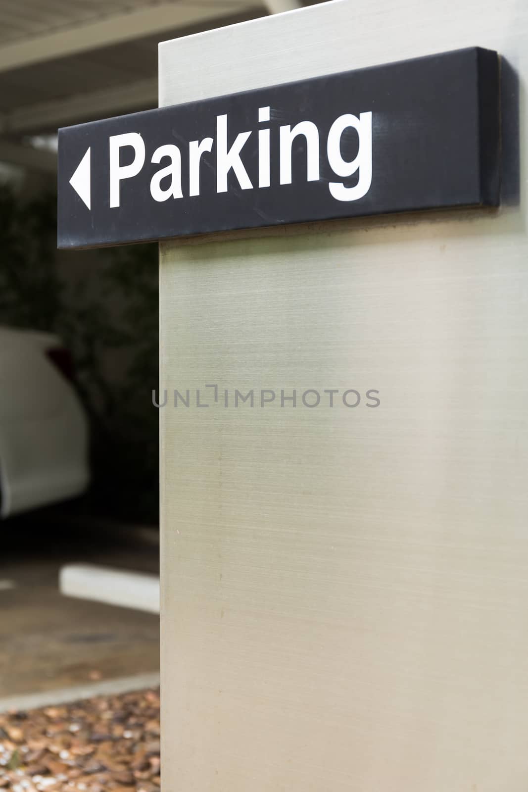 Parking sign guiding visitors to find their parking space.