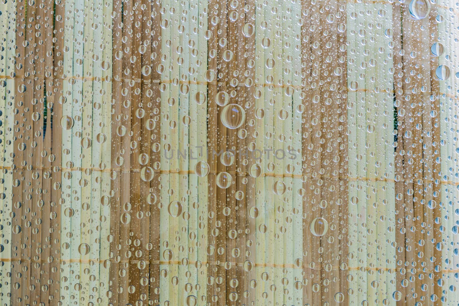 Water drop, droplet, raindrop of wooden mat background