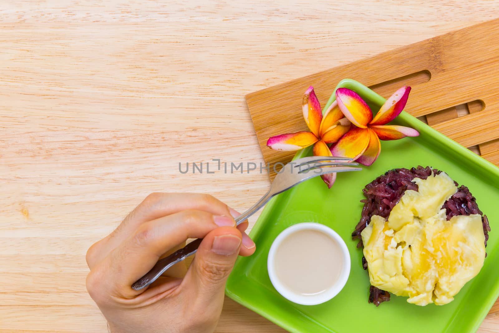 Durian with sticky rice is famous traditional Thai dessert menu.