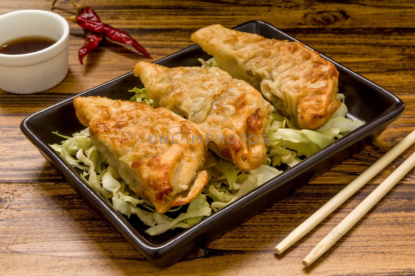 Gyoza, traditional pork dumpling, eaten with soy sauce popular in Japan and China.