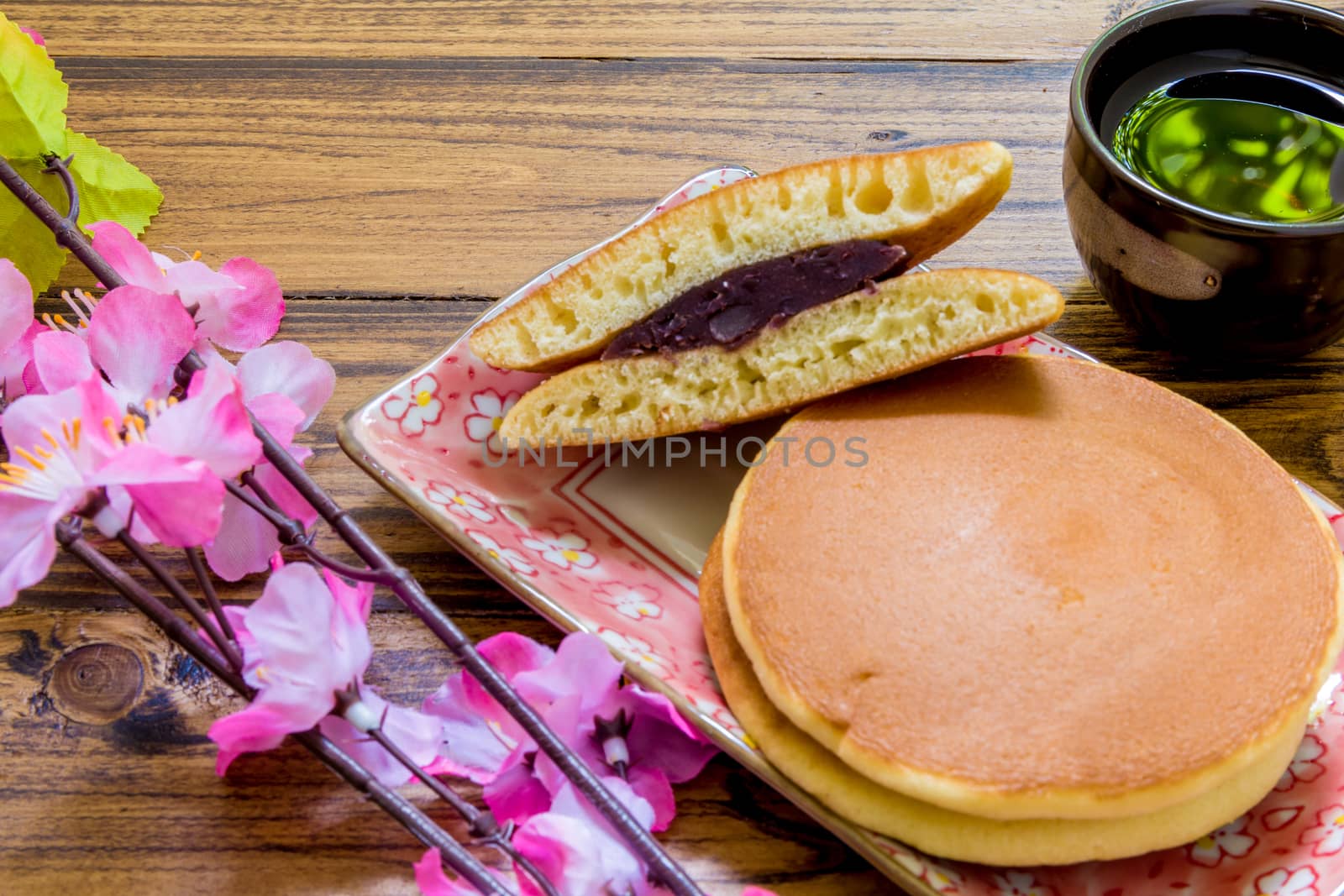 Dorayaki or Japanese pancake filled with red bean paste.