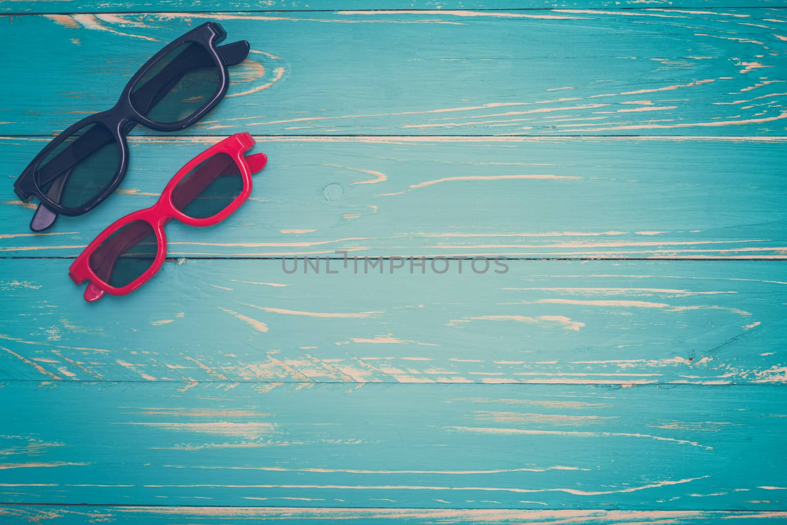 Sunglasses / Sunglasses on Wooden Background by supparsorn