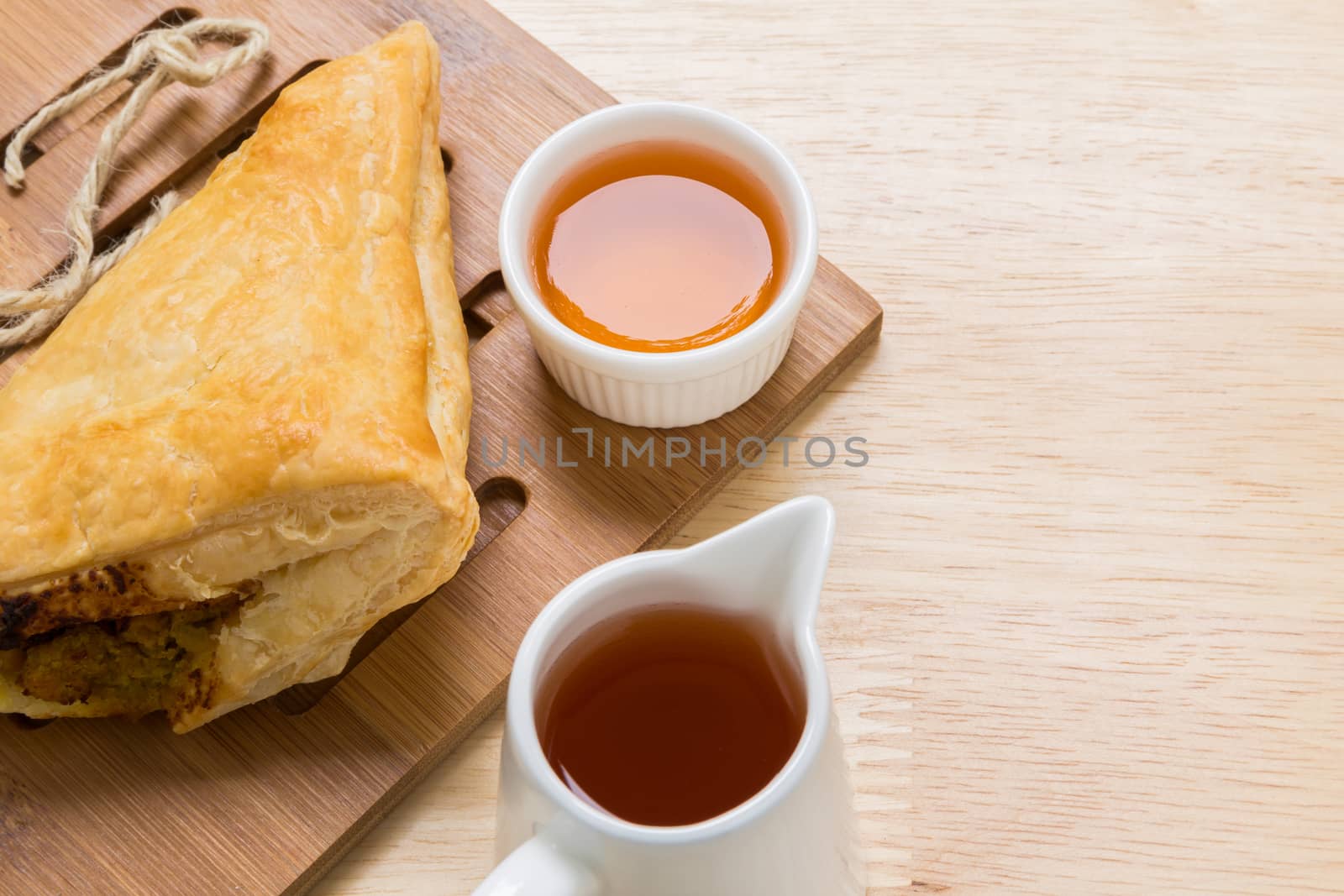 Freshly made puff pastry pie for tea break.