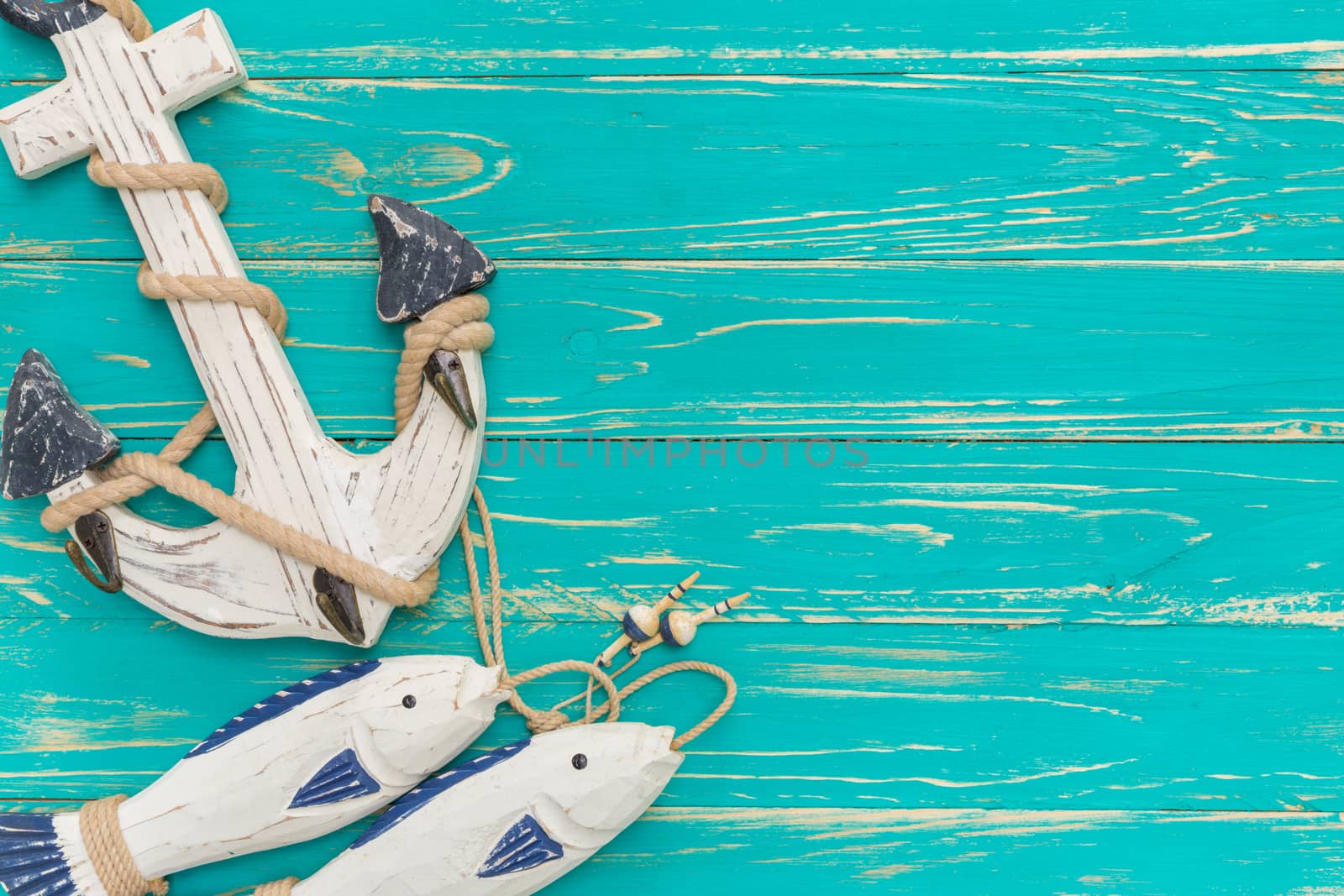 Vintage style of seashore decors on blue wooden background.