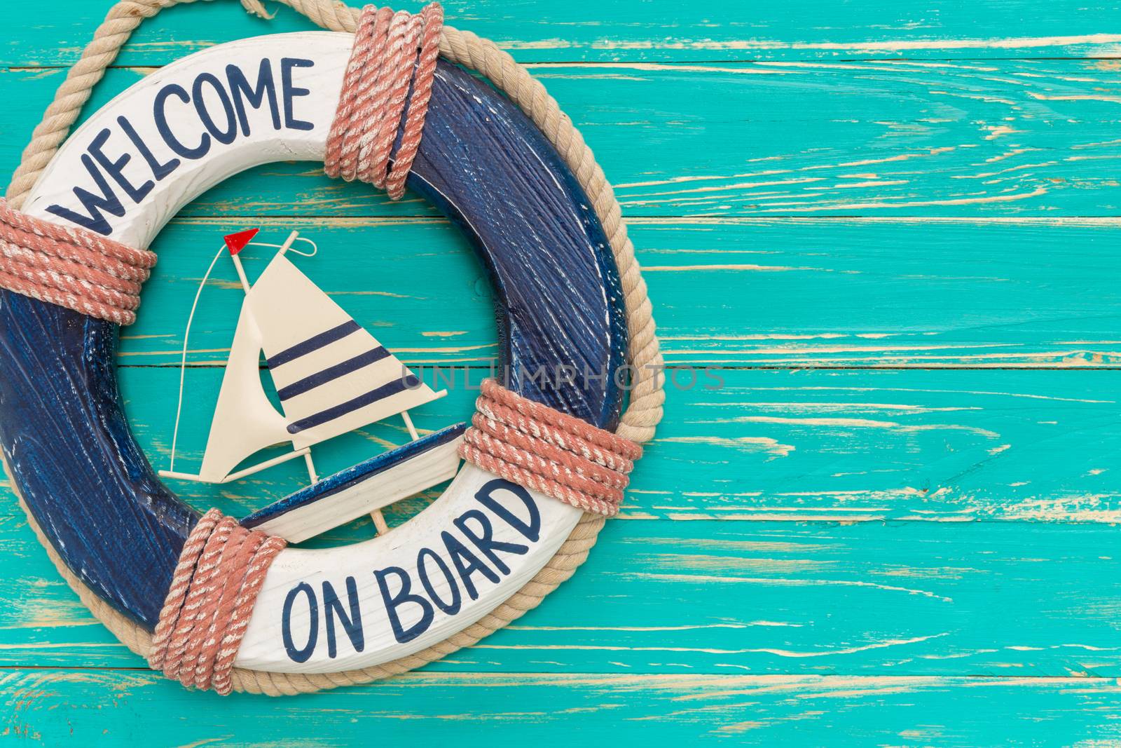 Vintage style of seashore decors on blue wooden background.