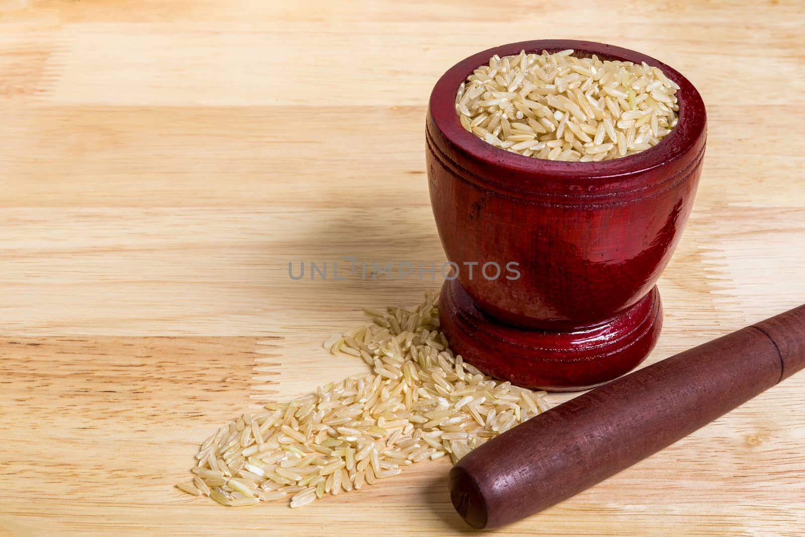 Uncooked Jasmine Brown Rice in Mortar