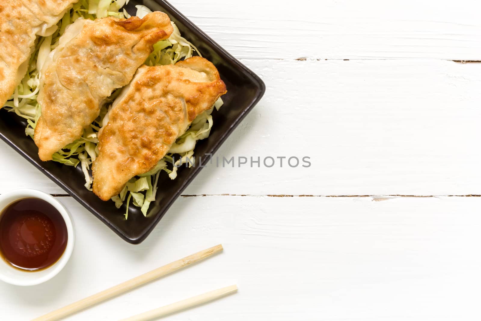 Gyoza, traditional pork dumpling, eaten with soy sauce popular in Japan and China.