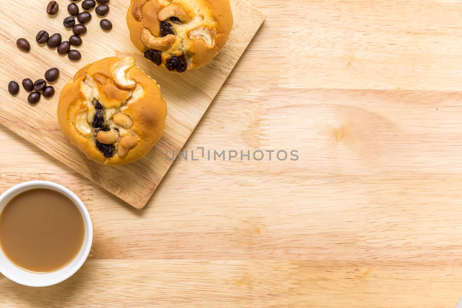 Homemade muffin for breakfast eaten with coffee.